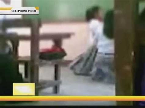 Teacher caught on cam abusing students .